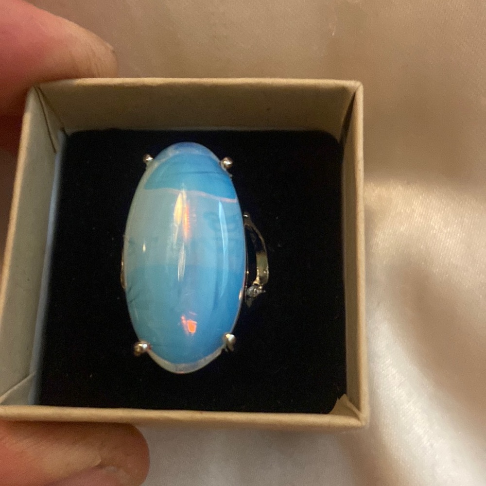 Beautiful opal stone dipped in sterling setting